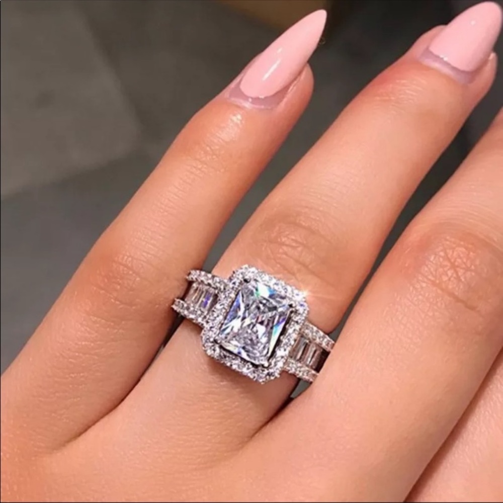 NEW. Silver Emerald Cut Crystal Ring